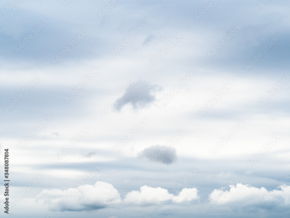 natural background - spring sky with white and gray clouds on cloudy day natural background - spring sky with white and gray clouds on cloudy day