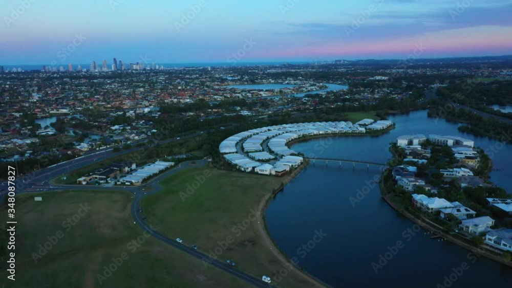 Pink sunset, Emerald lakes, Gold Coast, Surfers Paradise in distance Pink sunset, Emerald lakes, Gold Coast, Surfers Paradise in distance