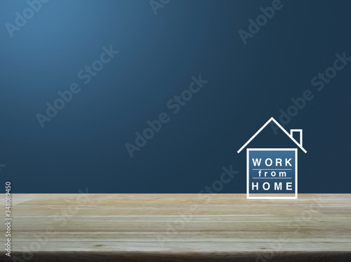 Work from home flat icon on wooden table over light blue gradient background, Business social distancing online concept