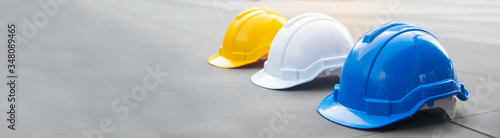Foto Banner Construction hard hat safety helmet workers in construction site for engineering protection head standard