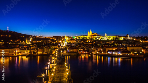 Night view of Prague castle and Charles Bridge over Vltava river © Zoltan