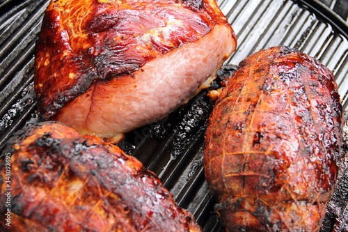 Canvas Print two roasts and a delicious prague ham on the grill