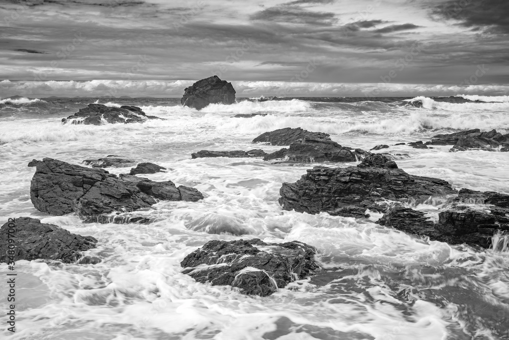 Black and white shot of stormy seas just before a typhoon