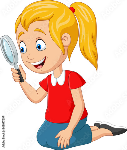 Cute girl using a magnifying glass