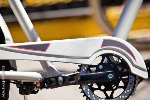 color bike with flower pattern model chopper  bicycle pedal detail chain in the city in summer
