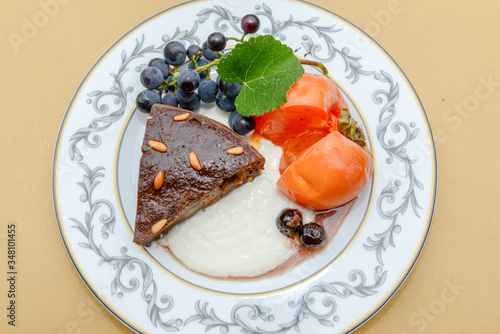 Bread cake with persimmon and grapes