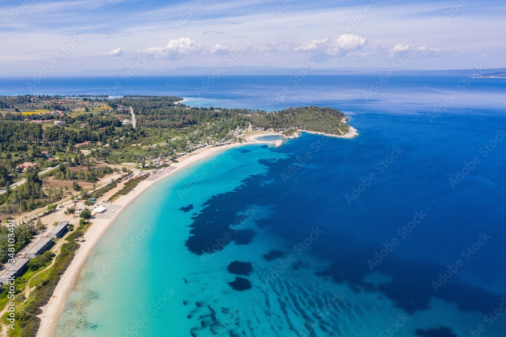 Aerial drone view of Paliouri Beach in Kassandra Sithonia penisula  Chalkidiki Greece
