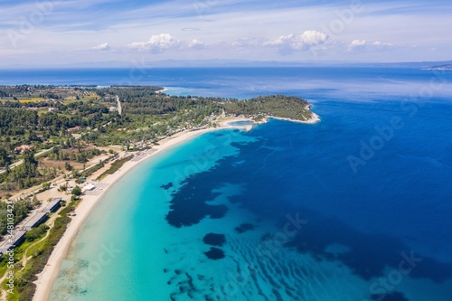 Aerial drone view of Paliouri Beach in Kassandra Sithonia penisula Chalkidiki Greece 