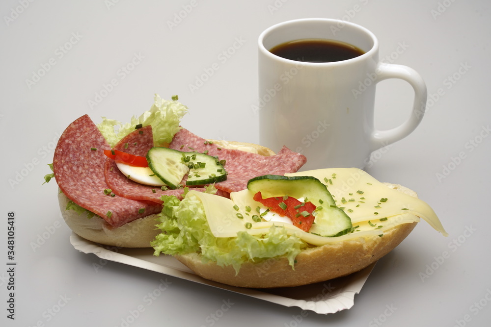 Zwei halbe Belegte Brötchen mit Salami und Käse, Tasse Kaffee Stock Photo |  Adobe Stock