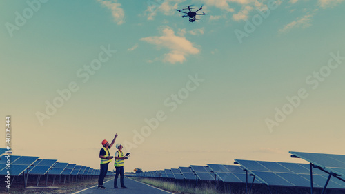 Wallpaper Mural Engineer inspect and checking solar panel by Drone at solar power plant Torontodigital.ca