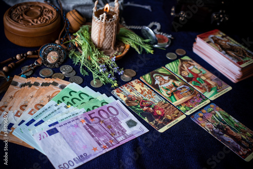  Magic for attracting money, rituals and fate prediction, details on a table of witch, occultism concept