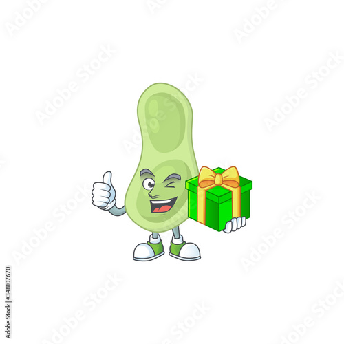 Smiley staphylococcus pneumoniae cartoon character holding a gift box