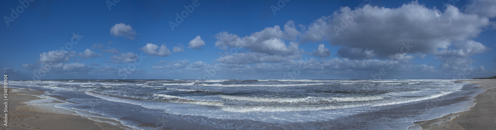 Northsea coast Netherlands. Julianadorp. Beach. Breaking waves. Clouds Panorama. Sea.