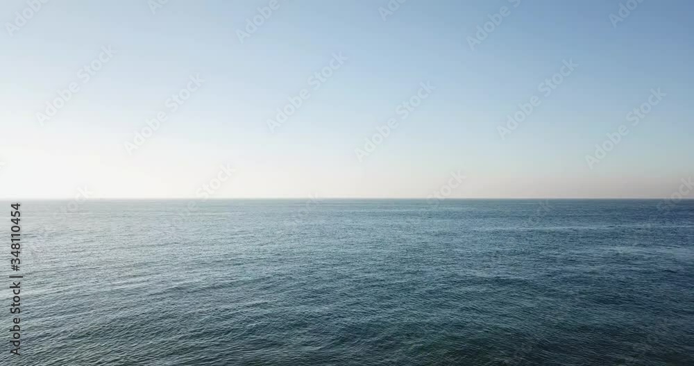 The surface of the ocean from a bird's-eye view at dawn The surface of the ocean from a bird's-eye view at dawn
