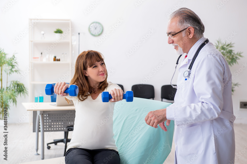Young injured woman visiting experienced doctor traumatologist Young injured woman visiting experienced doctor traumatologist