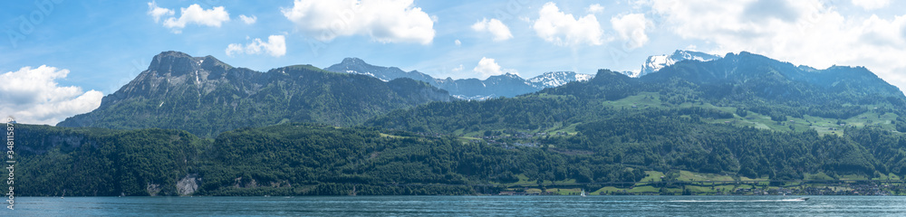 panoramic view into the mountains on lake lucerne end of spring