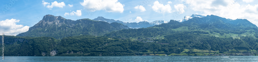 panoramic view into the mountains on lake lucerne end of spring panoramic view into the mountains on lake lucerne end of spring