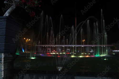 Batam, Indonesia – March 17, 2020: A fountain lights that illuminate a calm and quiet night, Batam Island, Indonesia on March 17, 2020“.