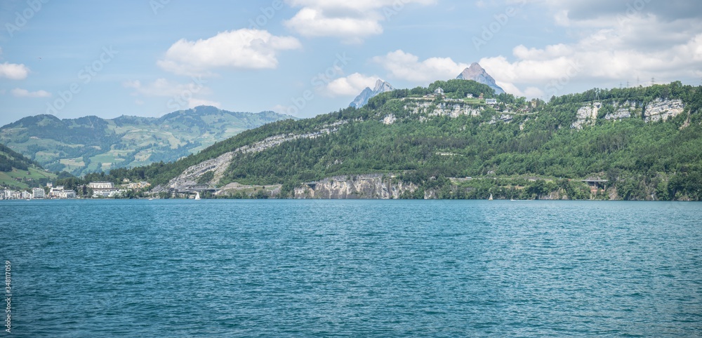 panoramic view at swiss alps on a boat cruise on lake lucerne