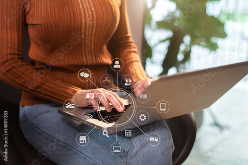 Women use the keyboard for laptops for mobile payments Omni channel online shopping. photo