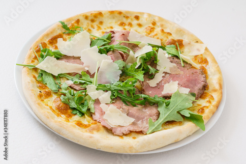 italian pizza with meat and cheese