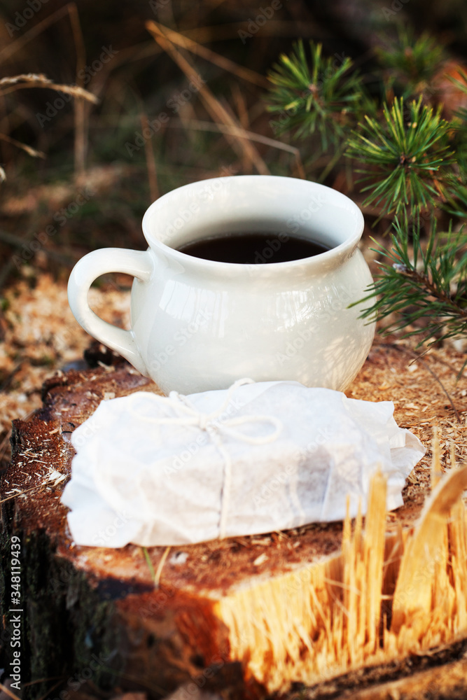 breakfast, afternoon tea in the woods. Coffee and sandwiches served in the woods on the tree. A break in the journey. A break at work in the forest.