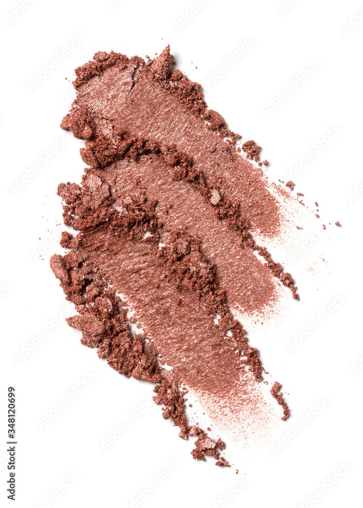 Close-up of make-up swatches. Smears of crushed shiny brown eye shadow Close-up of make-up swatches. Smears of crushed shiny brown eye shadow