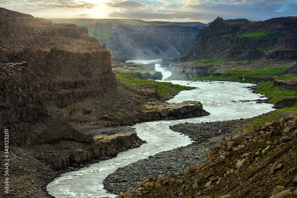 Large meandering water streams are water that comes from Hafragilsfoss ...