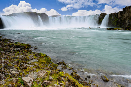 Godafoss waterfall The greatest and most magnificent in northern Iceland The summer season has blue skies and beautiful clouds.