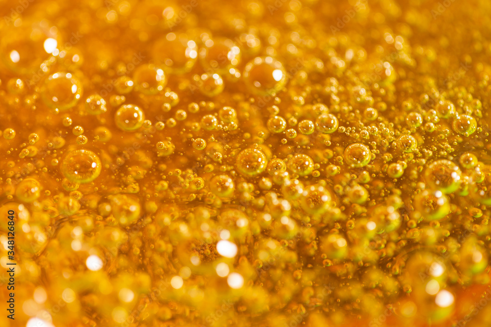 Depilation and beauty concept - close-up of sugar paste or honey wax for hair removing. Macro photo Depilation and beauty concept - close-up of sugar paste or honey wax for hair removing. Macro photo