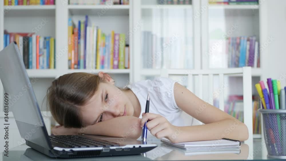 Bored Kid Studying for School, Tired Child at Study Office, Girl Doing Homework Bored Kid Studying for School, Tired Child at Study Office, Girl Doing Homework