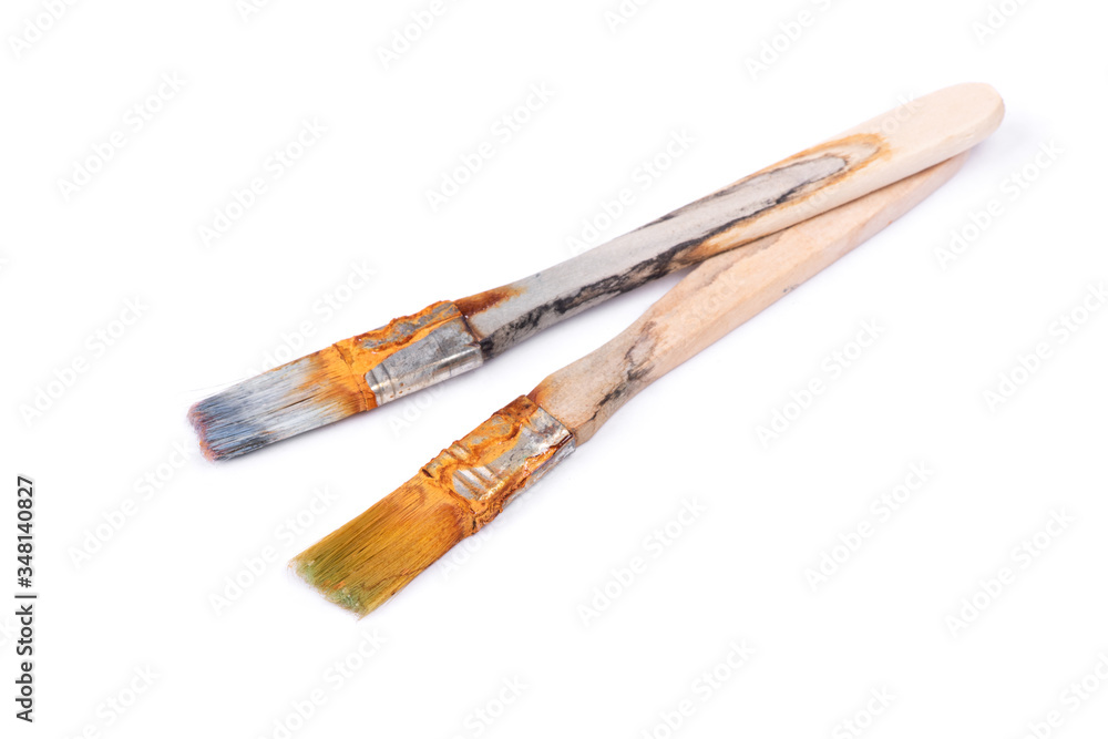 Obraz premium Dirty rusty paint brush isolated