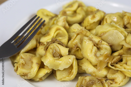 plate of tortellini on a table