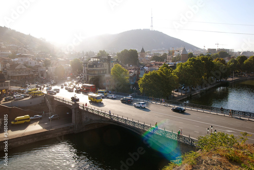 View of the Metekhi Bridge in Tbilisi at sunset
