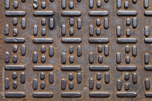 Manhole cover metallic back...