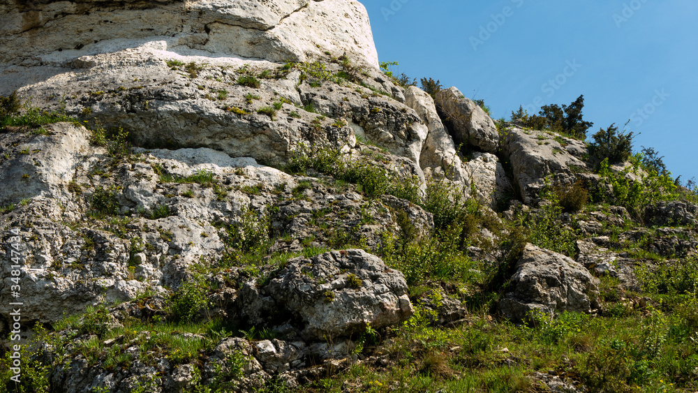 View of the Sokolich Mountains Reserve and rock stones in Olsztyn. A free space for an inscription View of the Sokolich Mountains Reserve and rock stones in Olsztyn. A free space for an inscription