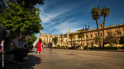 Seville, Spain - February 18th, 2020 - the Constitution Avenue near the Seville Cathedral and General Archive of the Indies in Seville, Spain. photo