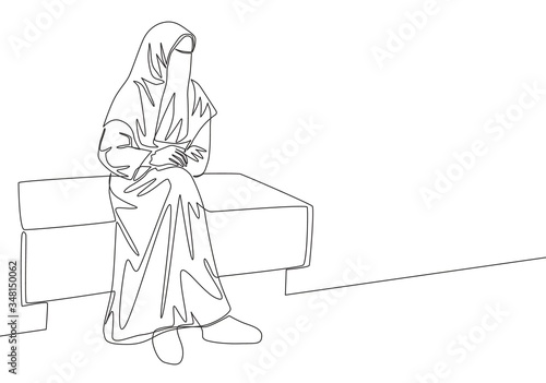 Single continuous line drawing of young attractive middle east muslimah wearing burqa siting on chair. Traditional beauty muslim woman niqab with hijab concept one line draw design vector illustration