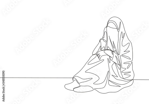 Single continuous line drawing of young attractive middle east muslimah wearing burqa sitting on the floor. Traditional muslim woman niqab with hijab concept one line draw design vector illustration