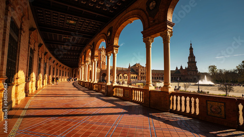 Seville, Spain - February 18th, 2020 - Seville City Center Plaza De Espana / Spain Square with Beautiful columns with Architecture Details and canal.