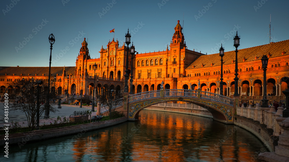Seville, Spain - February 18th, 2020 - Plaza de Espana / Spain Square with a beautiful view of the canal and Architecture Details in Seville City Center, Andalusia.