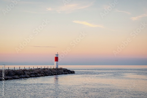 Lighthouse and beautiful sunset on lake Ontario. Rochester, USA