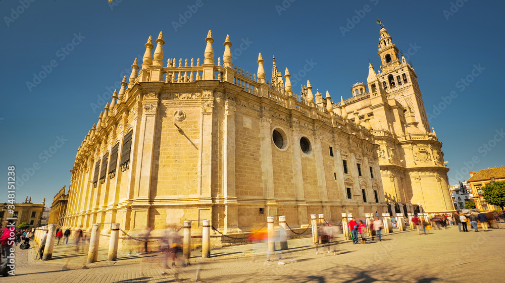 Seville, Spain - February 15th, 2020 - The Cathedral of Saint Mary of the See / Gothic Seville Cathedral with Beautiful Architecture in Seville City Center, Spain.