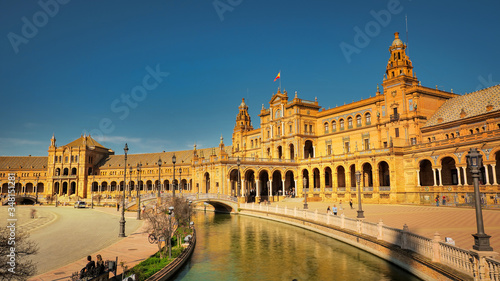 Seville, Spain - February 16th, 2020 - Plaza de Espana / Spain Square with the Canal and beautiful architecture details in Seville City, Spain.