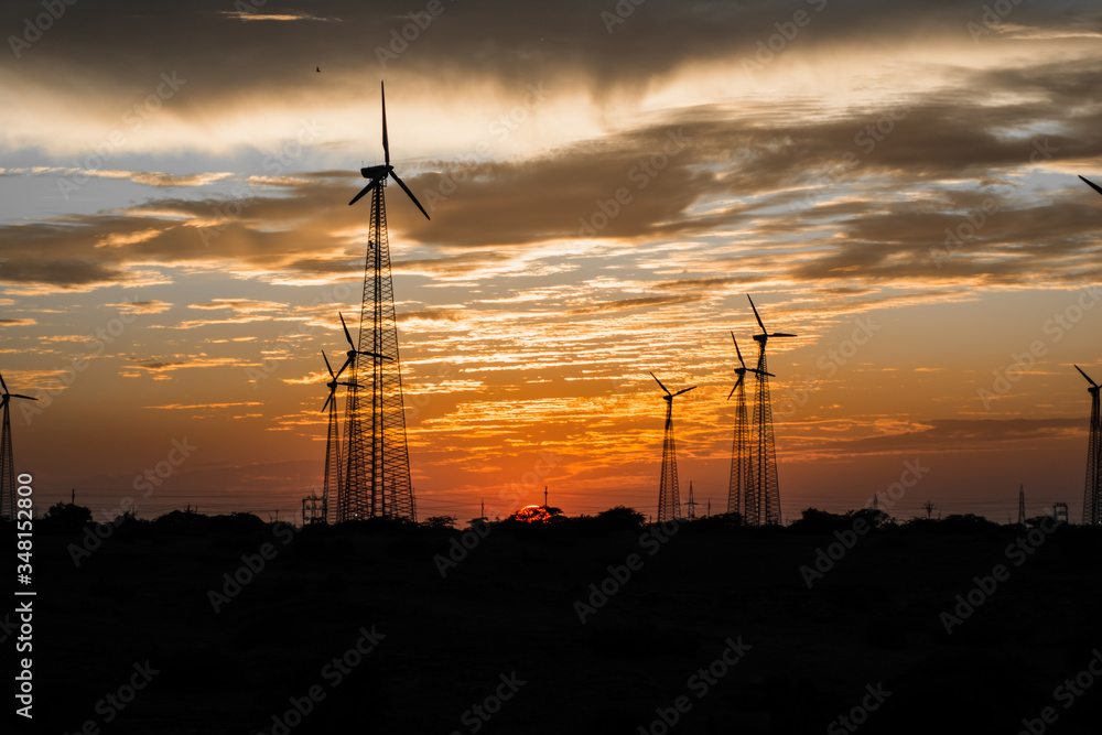 Windmills in Jaisalmer desert area, view from Bara bagh Jaisalmer, Rajasthan India
