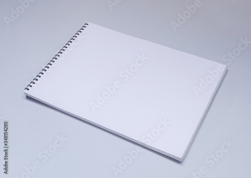 White Spiral Album or sketchbook mock up on light table