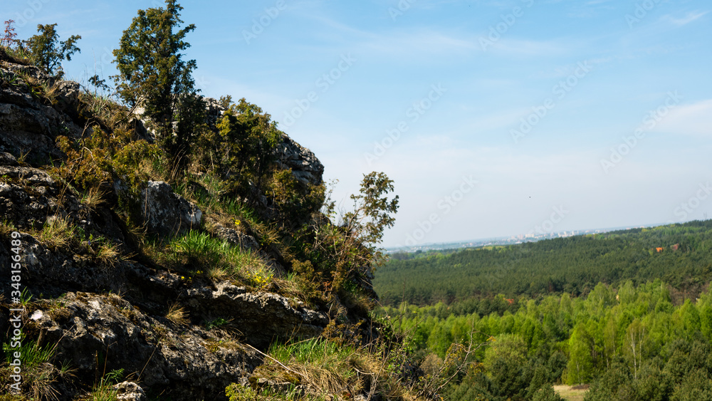 View of the Sokolich Mountains Reserve and rock stones in Olsztyn. A free space for an inscription