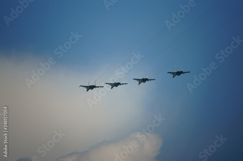 A flight of fighters at an air show.