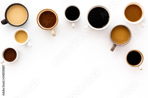 Lots of coffee on white table top view copy space