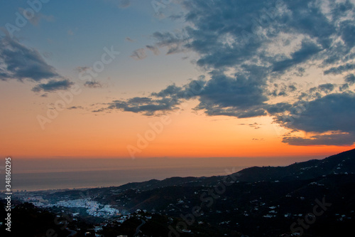 Sun Setting over Torrox Costa, Costa Tropical, The Axarquia, Malaga Province, Andalucia, Spain, Western Europe. © Andy Evans Photos